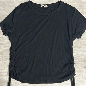 Black top with adjustable sides